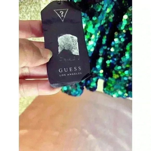 NWT Woman’s Guess Green Blue Yellow Sequence Shifting Peplum Top Medium - Picture 10 of 12